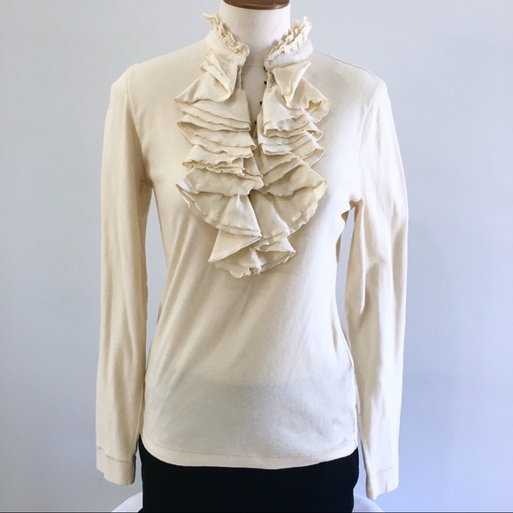 cream frilly blouse